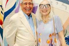 Happy elderly couple enjoying a cultural event together.