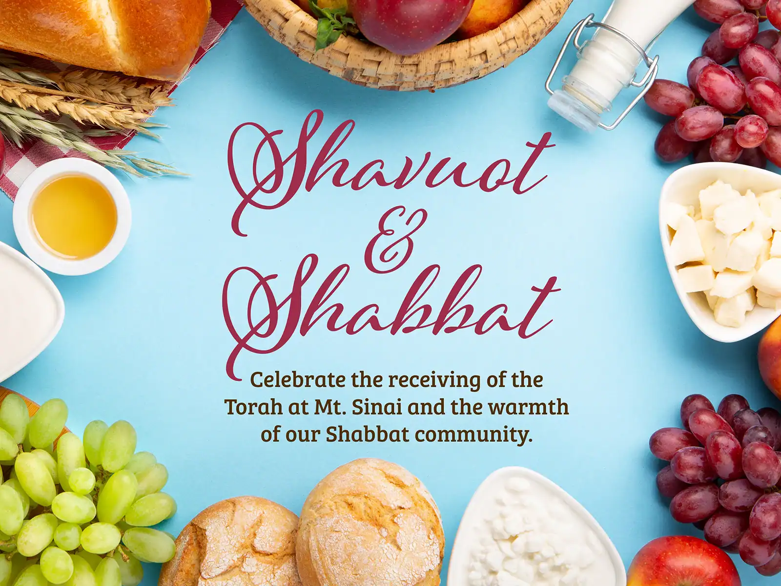 Shavuot and Shabbat celebration with food, wine, and grapes on a blue background.